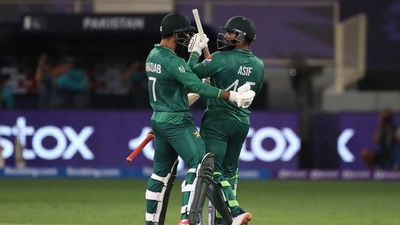 Pakistan's Asif Ali, right, celebrates with batting partner Shadab Khan after their win in the Cricket Twenty20 World Cup match between Pakistan and Afghanistan in Dubai, UAE, Friday, Oct. 29, 2021.&nbsp; (AP)