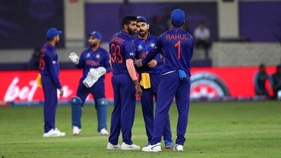 Indian cricket captain Virat Kohli, second right, talks to teammates during the last few overs of the Cricket Twenty20 World Cup match between India and Pakistan in Dubai, UAE, Sunday, Oct. 24, 2021. (AP) Indian cricket captain Virat Kohli, second right, talks to teammates during the last few overs of the Cricket Twenty20 World Cup match between India and Pakistan in Dubai, UAE, Sunday, Oct. 24, 2021. (AP)