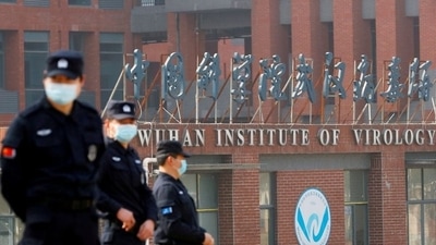 Security personnel keep watch outside the Wuhan Institute of Virology during the visit by the World Health Organisation (WHO) team tasked with investigating the origins of the coronavirus disease (Covid-19).&nbsp; (File Photo / REUTERS)