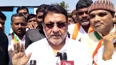 Nawab Malik said he will produce more proof to corroborate his claims and expose Wankhede. He alleged that Wankhede implicated people in false cases and tried to delay their bail for cheap publicity. (ANI) Nawab Malik said he will produce more proof to corroborate his claims and expose Wankhede. He alleged that Wankhede implicated people in false cases and tried to delay their bail for cheap publicity. (ANI)