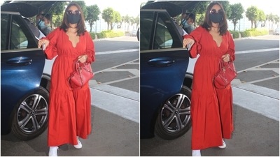 Ileana looked stunning in the bright red midi dress as she arrived at the Mumbai airport. Her ankle-length dress featured a fit-and-flare silhouette along with tiers on the skirt. The gathered balloon sleeves and the ill-fitting of the dress made it a perfect choice for a long flight. (HT Photo/Varinder Chawla) Ileana looked stunning in the bright red midi dress as she arrived at the Mumbai airport. Her ankle-length dress featured a fit-and-flare silhouette along with tiers on the skirt. The gathered balloon sleeves and the ill-fitting of the dress made it a perfect choice for a long flight. (HT Photo/Varinder Chawla)