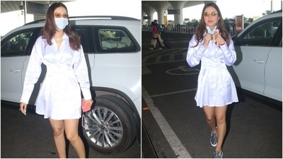Jasmin's dress also featured a cinched-in detail on the waist that accentuated her frame aesthetically. She teamed her look with patterned Christian Dior slides, tinted sunglasses, pastel blue nail paint, and a face mask. (HT Photo/Varinder Chawla) Jasmin's dress also featured a cinched-in detail on the waist that accentuated her frame aesthetically. She teamed her look with patterned Christian Dior slides, tinted sunglasses, pastel blue nail paint, and a face mask. (HT Photo/Varinder Chawla)