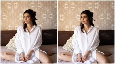 Karishma chose to give a messy look to her pictures with a messy half bun. (Instagram/@karishmaktanna) Karishma chose to give a messy look to her pictures with a messy half bun. (Instagram/@karishmaktanna)