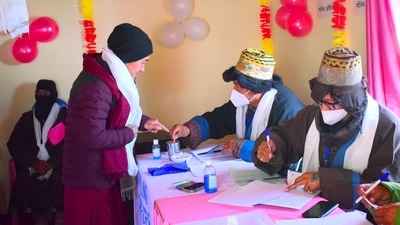 Election official marking ink on the finger of a voter during the Mandi Lok Sabha bypoll at the world's highest polling station at Tashigang in Lahaul-Spiti district on Saturday. (ANI Photo) (Ajay Kumar) Election official marking ink on the finger of a voter during the Mandi Lok Sabha bypoll at the world's highest polling station at Tashigang in Lahaul-Spiti district on Saturday. (ANI Photo) (Ajay Kumar)