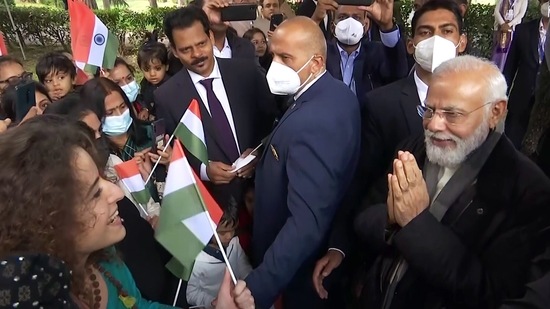 Prime Minister Narendra Modi interacts with the Indian community at Piazza Gandhi, in Rome on Friday. (ANI Photo)(ANI)