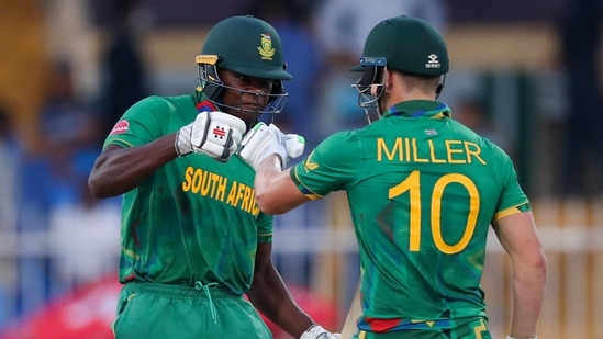 South Africa's Kagiso Rabada, left, and teammate David Miller gesture during the Cricket Twenty20 World Cup match between South Africa and Sri Lanka in Sharjah, UAE, Saturday, Oct. 30, 2021. (AP Photo/Kamran Jebreili)(AP)