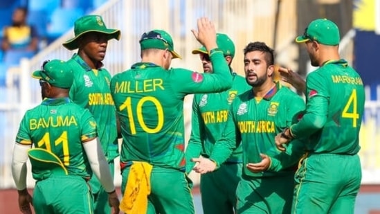 South Africa's Tabraiz Shamsi, second right, is congratulated by teammates after taking the wicket of Sri Lanka's Bhanuka Rajapaksa during the Cricket Twenty20 World Cup match between South Africa and Sri Lanka in Sharjah, UAE, Saturday, Oct. 30, 2021. (AP Photo/Kamran Jebreili)(AP)