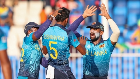 Sri Lanka's Dushmantha Chameera, centre, is congratulated by teammates after taking the wicket of South Africa's Reeza Hendricks during the Cricket Twenty20 World Cup match between South Africa and Sri Lanka in Sharjah, UAE, Saturday, Oct. 30, 2021. (AP Photo/Kamran Jebreili)(AP)