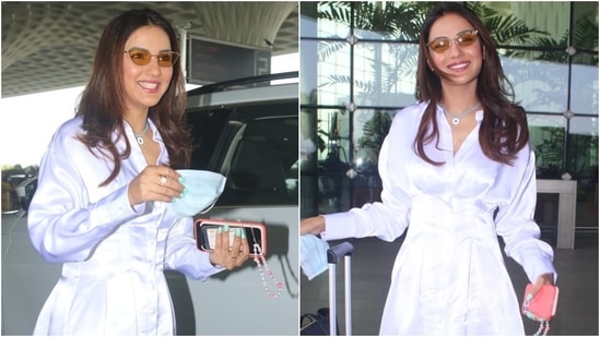 Jasmin Bhasin arrived at the Mumbai airport today looking sweet and sassy at the same time in a chic dress. The star took a flight out of the bay today, October 30. Her fans couldn't help but fall in love with her style. Moreover, Jasmin also impressed the fashion police.(HT Photo/Varinder Chawla)