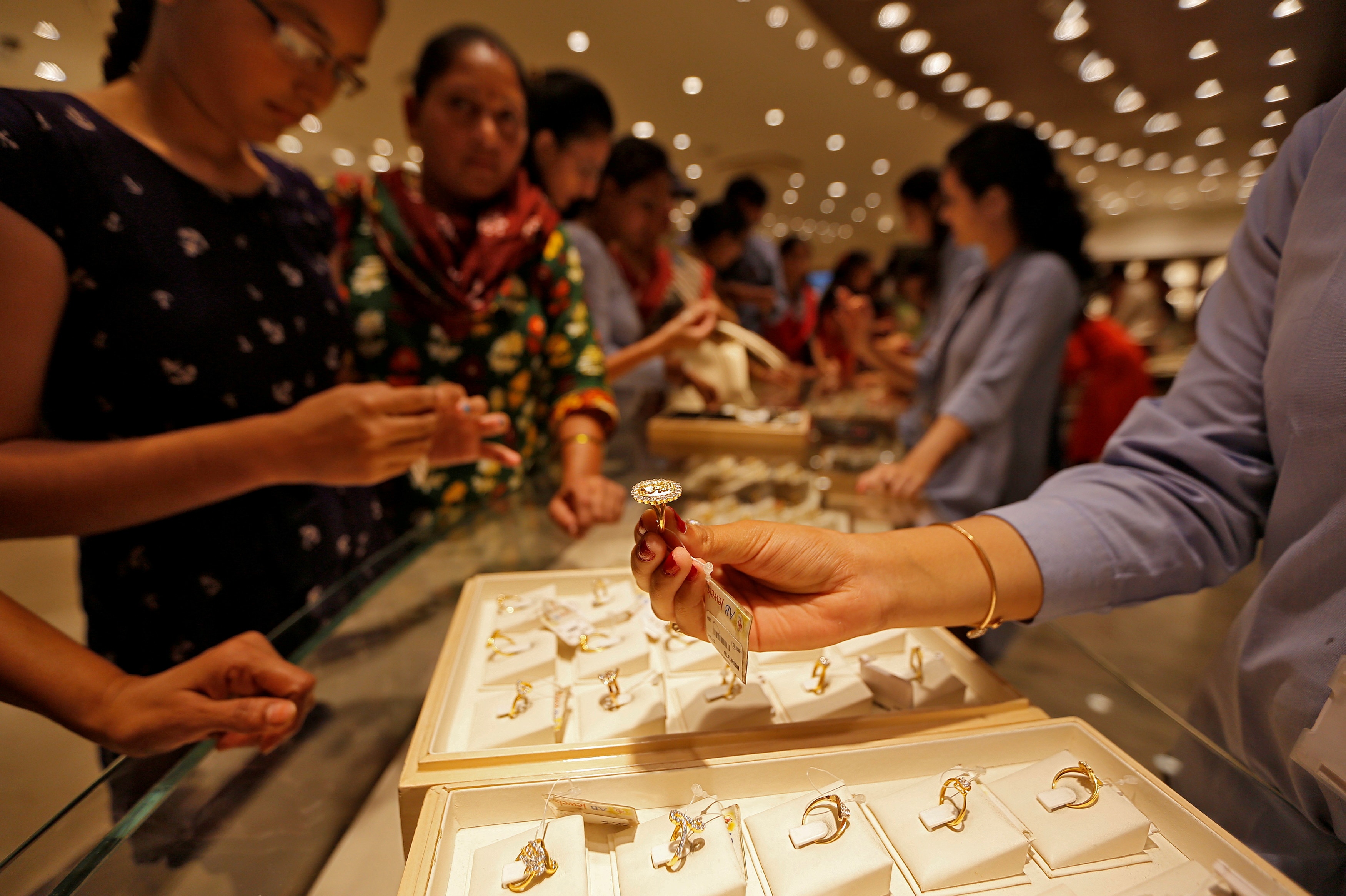 On the day of dhanteras people buy utensils and jewellery to attract prosperity and wealth. (REUTERS)