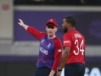 England's captain Eoin Morgan, left, talks to Chris Jordan during the Cricket Twenty20 World Cup match between Australia and England in Dubai, UAE, Saturday, Oct. 30, 2021. England's captain Eoin Morgan, left, talks to Chris Jordan during the Cricket Twenty20 World Cup match between Australia and England in Dubai, UAE, Saturday, Oct. 30, 2021. 