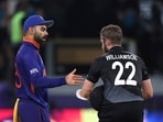 India's captain Virat Kohli, left, shakes hand with New Zealand's captain Kane Williamson after New Zealand won the game during the Cricket Twenty20 World Cup match in Dubai, UAE, Sunday, Oct. 31, 2021. (AP Photo/Aijaz Rahi)(AP)