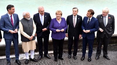 World leaders at the Trevi fountain in Rome on Sunday on the sidelines of the G20 of World Leaders Summit. (AFP) World leaders at the Trevi fountain in Rome on Sunday on the sidelines of the G20 of World Leaders Summit. (AFP)