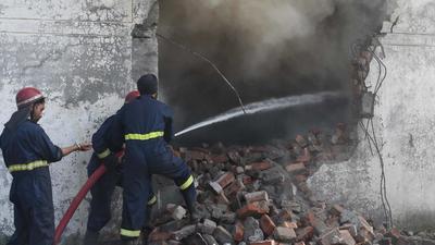 Firefighting operation in progress near Tajpur Road in Ludhiana on Sunday. (Harsimar Pal Singh/Hindustan Times) Firefighting operation in progress near Tajpur Road in Ludhiana on Sunday. (Harsimar Pal Singh/Hindustan Times)
