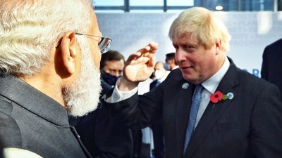Prime Minister Narendra Modi with UK Prime Minister Boris Johnson at G20 Summit, in Rome. (ANI ) Prime Minister Narendra Modi with UK Prime Minister Boris Johnson at G20 Summit, in Rome. (ANI )