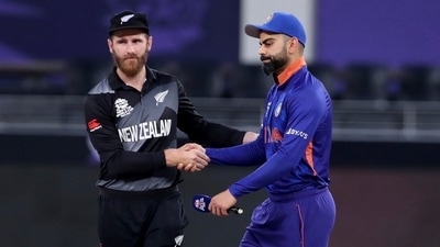 Dubai: India's captain Virat Kohli, right, reacts as he shakes hands with New Zealand's captain Kane Williamson after losing the toss ahead of the Cricket Twenty20 World Cup match between New Zealand and India in Dubai, UAE, Sunday, Oct. 31, 2021. AP/PTI(AP10_31_2021_000182A) (AP) Dubai: India's captain Virat Kohli, right, reacts as he shakes hands with New Zealand's captain Kane Williamson after losing the toss ahead of the Cricket Twenty20 World Cup match between New Zealand and India in Dubai, UAE, Sunday, Oct. 31, 2021. AP/PTI(AP10_31_2021_000182A) (AP)