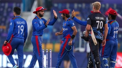 Afghanistan players celebrate after defeating Namibia by 62 runs in their Cricket Twenty20 World Cup match in Abu Dhabi, UAE, Sunday, Oct. 31, 2021. (AP Photo/Kamran Jebreili) (AP) Afghanistan players celebrate after defeating Namibia by 62 runs in their Cricket Twenty20 World Cup match in Abu Dhabi, UAE, Sunday, Oct. 31, 2021. (AP Photo/Kamran Jebreili) (AP)