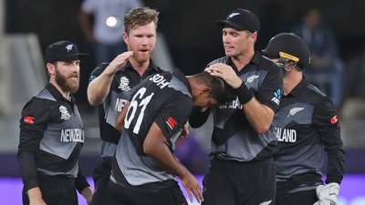 New Zealand players congratulate Ish Sodhi, center, for taking India's captain Virat Kohli wicket during the Cricket Twenty20 World Cup match between New Zealand and India in Dubai, UAE, Sunday, Oct. 31, 2021. (AP Photo/Aijaz Rahi) (AP) New Zealand players congratulate Ish Sodhi, center, for taking India's captain Virat Kohli wicket during the Cricket Twenty20 World Cup match between New Zealand and India in Dubai, UAE, Sunday, Oct. 31, 2021. (AP Photo/Aijaz Rahi) (AP)