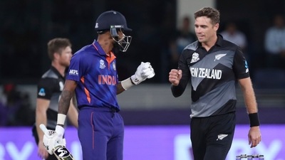 New Zealand's Tim Southee, right, gives a fist touch to India's Hardik Pandya during the Cricket Twenty20 World Cup match between New Zealand and India in Dubai, UAE, Sunday, Oct. 31, 2021. (AP Photo/Aijaz Rahi) (AP) New Zealand's Tim Southee, right, gives a fist touch to India's Hardik Pandya during the Cricket Twenty20 World Cup match between New Zealand and India in Dubai, UAE, Sunday, Oct. 31, 2021. (AP Photo/Aijaz Rahi) (AP)