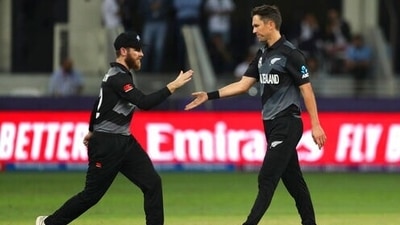 New Zealand's Trent Boult, right, celebrates the wicket of India's Hardik Pandya with captain Kane Williamson during the Cricket Twenty20 World Cup match between New Zealand and India in Dubai, UAE, Sunday, Oct. 31, 2021. (AP Photo/Aijaz Rahi) (AP) New Zealand's Trent Boult, right, celebrates the wicket of India's Hardik Pandya with captain Kane Williamson during the Cricket Twenty20 World Cup match between New Zealand and India in Dubai, UAE, Sunday, Oct. 31, 2021. (AP Photo/Aijaz Rahi) (AP)