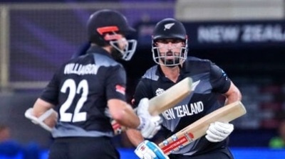 New Zealand's Daryl Mitchell, right, and New captain Kane Williamson run between wickets during the Cricket Twenty20 World Cup match between New Zealand and India in Dubai, UAE, Sunday, Oct. 31, 2021. (AP Photo/Aijaz Rahi) (AP) New Zealand's Daryl Mitchell, right, and New captain Kane Williamson run between wickets during the Cricket Twenty20 World Cup match between New Zealand and India in Dubai, UAE, Sunday, Oct. 31, 2021. (AP Photo/Aijaz Rahi) (AP)