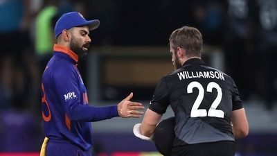 India's captain Virat Kohli, left, shakes hand with New Zealand's captain Kane Williamson after New Zealand won the game during the Cricket Twenty20 World Cup match in Dubai, UAE, Sunday, Oct. 31, 2021. (AP Photo/Aijaz Rahi) (AP) India's captain Virat Kohli, left, shakes hand with New Zealand's captain Kane Williamson after New Zealand won the game during the Cricket Twenty20 World Cup match in Dubai, UAE, Sunday, Oct. 31, 2021. (AP Photo/Aijaz Rahi) (AP)