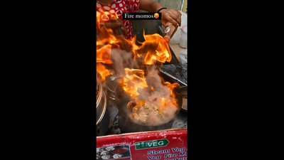 The image is taken from the video of the ‘fire momos.’ (Instagram/@paidaishi_foodie)