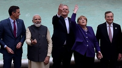 Prime Minister Narendra Modi and other G20 leaders throw a coin in the water during a visit to the Trevi fountain in central Rome. (AFP) Prime Minister Narendra Modi and other G20 leaders throw a coin in the water during a visit to the Trevi fountain in central Rome. (AFP)