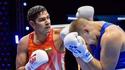 Belgrade: India's boxer Narender punches his opponent during their bout at AIBA Men�s World Boxing Championships in Belgrade, Serbia. (PTI) Belgrade: India's boxer Narender punches his opponent during their bout at AIBA Men�s World Boxing Championships in Belgrade, Serbia. (PTI)