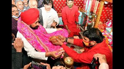 Punjab chief minister Charanjit Singh Channi offers prayers at the Devi Talab Mandir in Jalandhar on Sunday. Punjab chief minister Charanjit Singh Channi offers prayers at the Devi Talab Mandir in Jalandhar on Sunday.