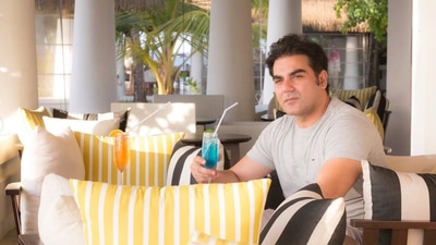 Arbaaz enjoying a welcome drink at the resort. Arbaaz enjoying a welcome drink at the resort.