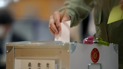 Japan election: Voters in Tokyo have said the coronavirus crisis was an important factor in their decision. (Eugene Hoshiko / AP) Japan election: Voters in Tokyo have said the coronavirus crisis was an important factor in their decision. (Eugene Hoshiko / AP)