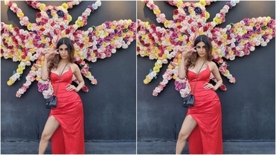 Mouni's dress is from the shelves of clothing label Atelier Romea Adler. She teamed the floor-grazing attire with a Chanel chain bag, which she wore over her body, and black pointed leather pumps. (Instagram/@imouniroy) Mouni's dress is from the shelves of clothing label Atelier Romea Adler. She teamed the floor-grazing attire with a Chanel chain bag, which she wore over her body, and black pointed leather pumps. (Instagram/@imouniroy)