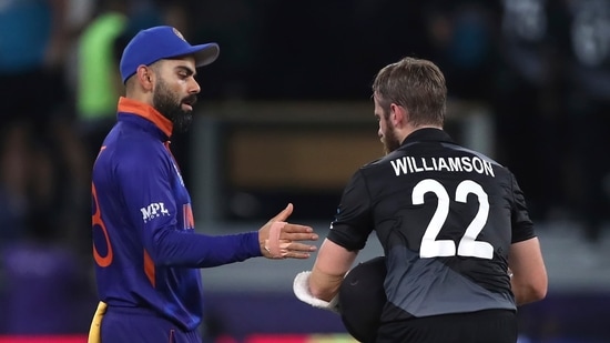 India's captain Virat Kohli, left, shakes hand with New Zealand's captain Kane Williamson after New Zealand won the game during the Cricket Twenty20 World Cup match in Dubai, UAE, Sunday, Oct. 31, 2021. (AP Photo/Aijaz Rahi)(AP)