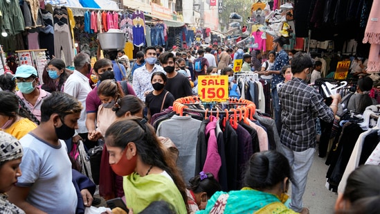 People shop for the Diwali festival at the Sarojini Nagar market, in New Delhi.(PTI Photo/Vijay Verma)