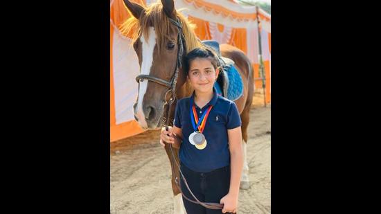 Mehreen Sidhu, 9, from Chandigarh Horse Riding Society bagged three medals during the three-day championship. (HT photo)