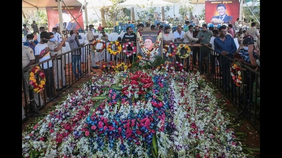 Fans flock Bengaluru’s Kanteerava studio to the pay their respects to late Kannada actor Puneeth Rajkumar, on Sunday. (AFP)