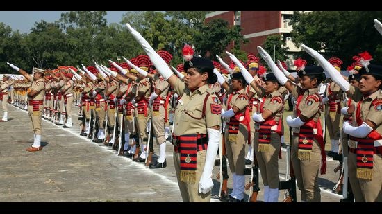 Police officers participating in a parade at Parade Ground in Sector 17, Chandigarh, during the state-level celebrations of the National Unity Day on Sunday. (HT photo)