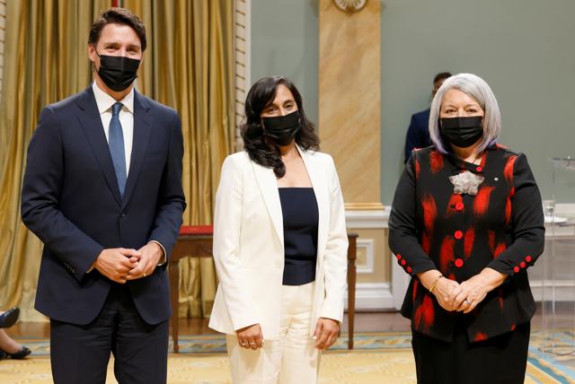 Canada's Prime Minister Justin Trudeau and Governor General Mary May Simon pose with Minister of National Defence Anita Anand (REUTERS)
