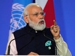 Prime Minister Narendra Modi reiterated that rich countries have to ramp up their contributions to help less developed nations decarbonise.(AFP)