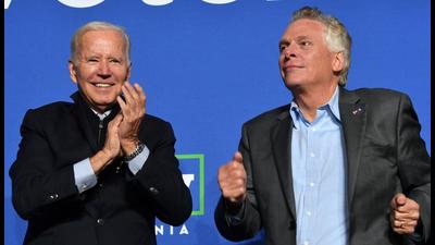 US President Joe Biden (left) and Virginia Democratic gubernatorial candidate Terry McAuliffe gesture during a campaign event at Virginia Highlands Park in Arlington, Virginia. At the rally, Biden attacked his predecessor Donald Trump at least 27 times. (AFP) US President Joe Biden (left) and Virginia Democratic gubernatorial candidate Terry McAuliffe gesture during a campaign event at Virginia Highlands Park in Arlington, Virginia. At the rally, Biden attacked his predecessor Donald Trump at least 27 times. (AFP)