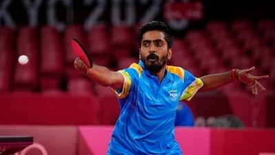 Sathiyan Gnanasekaran of India competes during the table tennis men's singles second-round match against Lam Siu Hang of Hong Kong at the 2020 Summer Olympics, Sunday. (AP) Sathiyan Gnanasekaran of India competes during the table tennis men's singles second-round match against Lam Siu Hang of Hong Kong at the 2020 Summer Olympics, Sunday. (AP)