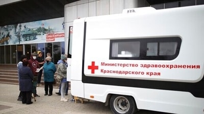 People gather to receive Russia's Sputnik V coronavirus vaccine at a mobile vaccination center in Krymsk, Krasnodar region on Friday. (AP Photo) People gather to receive Russia's Sputnik V coronavirus vaccine at a mobile vaccination center in Krymsk, Krasnodar region on Friday. (AP Photo)