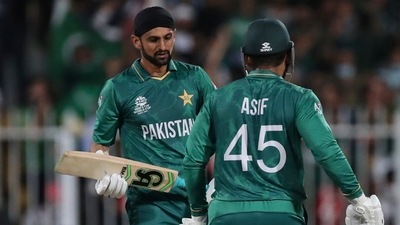 Pakistan's Shoaib Malik, left, celebrates with Asif Ali after hitting a boundary during the Cricket Twenty20 World Cup match between New Zealand and Pakistan in Sharjah, UAE. (AP) Pakistan's Shoaib Malik, left, celebrates with Asif Ali after hitting a boundary during the Cricket Twenty20 World Cup match between New Zealand and Pakistan in Sharjah, UAE. (AP)