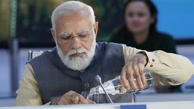 India Prime Minister Narendra Modi attends an event about global supply chains during the G20 leaders summit on Sunday. He will hold a meeting with 40 district magistrates across the country where the Covid-19 vaccination coverage has been sluggish. (AP) India Prime Minister Narendra Modi attends an event about global supply chains during the G20 leaders summit on Sunday. He will hold a meeting with 40 district magistrates across the country where the Covid-19 vaccination coverage has been sluggish. (AP)