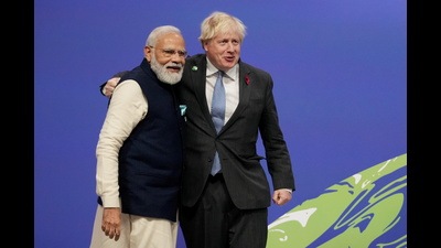 Britain's PM Boris Johnson greets India's PM Narendra Modi during arrivals at the UN Climate Change Conference (COP26) in Glasgow, Scotland. (REUTERS) Britain's PM Boris Johnson greets India's PM Narendra Modi during arrivals at the UN Climate Change Conference (COP26) in Glasgow, Scotland. (REUTERS)