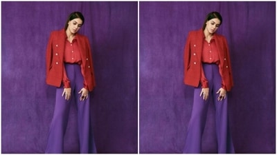 Genelia opted for a red satin shirt and a blue pair of satin trousers to set standards of formal fashion higher. (Instagram/@who_wore_what_when) Genelia opted for a red satin shirt and a blue pair of satin trousers to set standards of formal fashion higher. (Instagram/@who_wore_what_when)