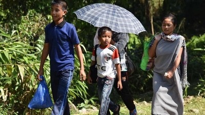 People of Meghalaya’s Khasi tribe go about doing their chores in Mawlynnong. (AFP) People of Meghalaya’s Khasi tribe go about doing their chores in Mawlynnong. (AFP)