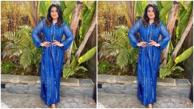 Raveena accessorised her look for the day with statement blue earrings and a ring. (Instagram/@officialraveenatandon) Raveena accessorised her look for the day with statement blue earrings and a ring. (Instagram/@officialraveenatandon)