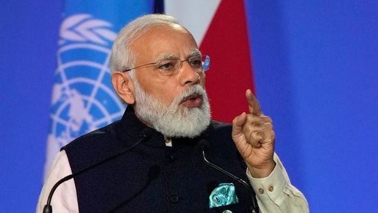 Prime Minister Narendra Modi reiterated that rich countries have to ramp up their contributions to help less developed nations decarbonise.(AFP)
